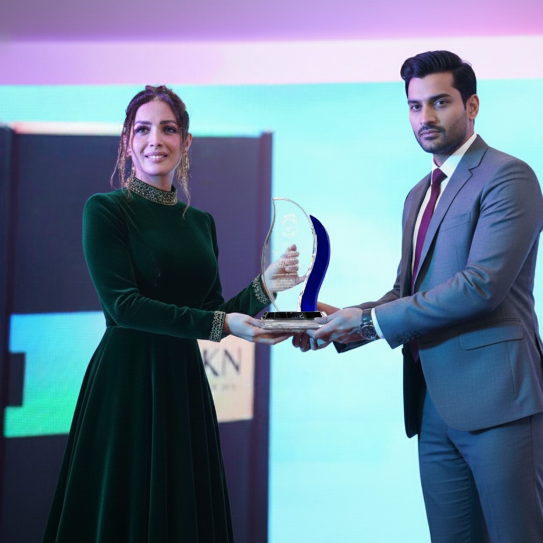 Person receiving an award on stage